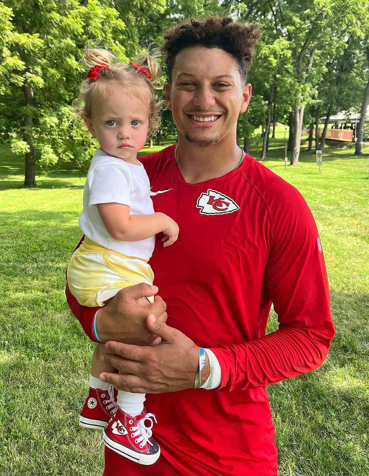 Patrick Mahomes Smiles with Daughter at Kansas City Chiefs' Family Day